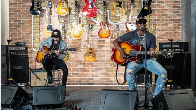Gibson Gives Ryan Seacrest Jimmie Allen performs at the Gibson Garage in Nashville
